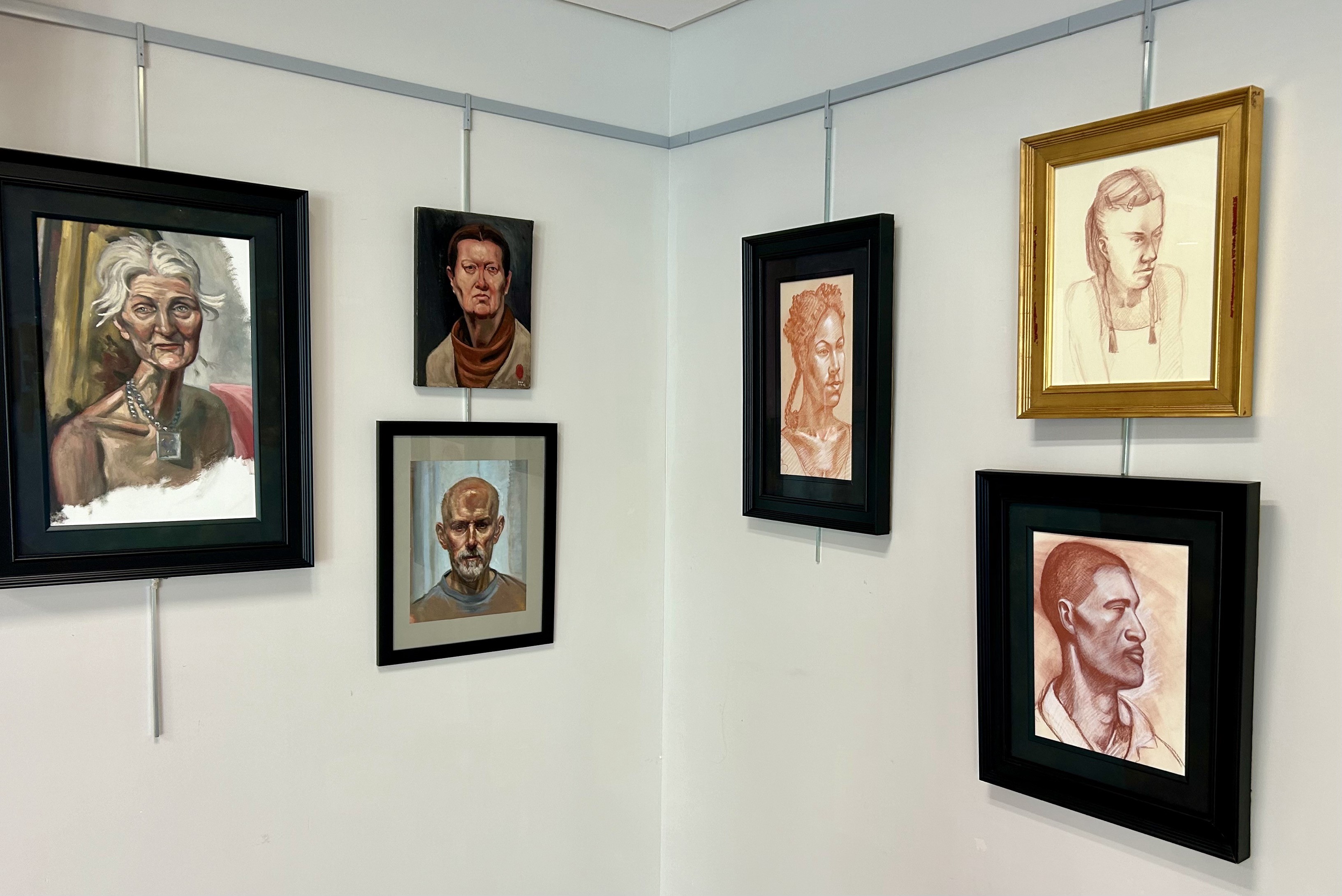 paintings of various human faces