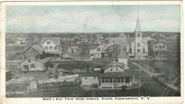Postcard with bird's eye view from School. 