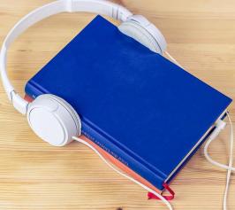 Blue book with headphones